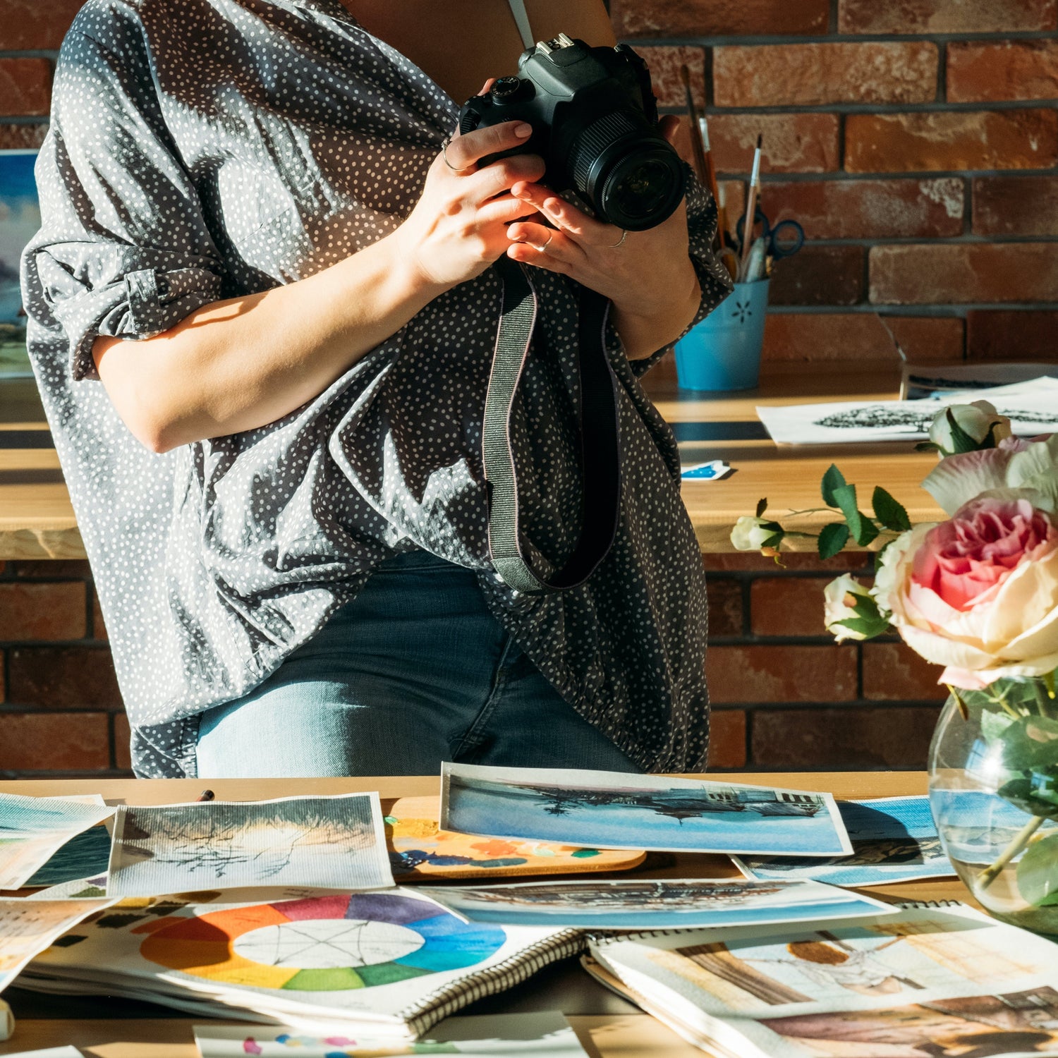 Artist with Camera Taking Photos of Original Artwork