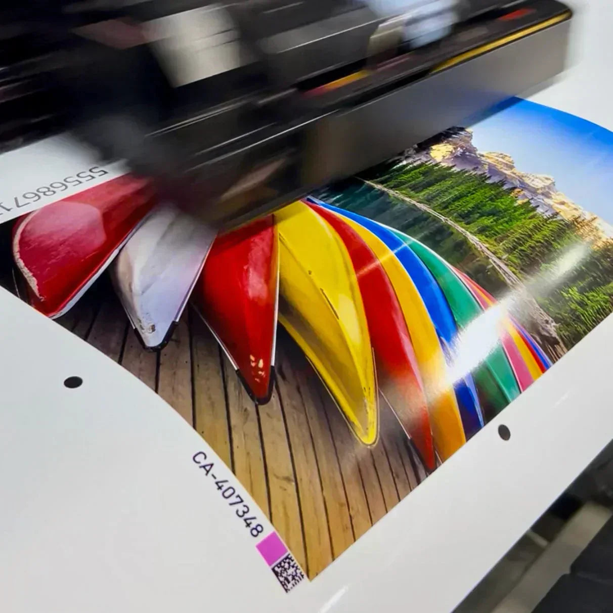 Photo printer in the process of printing a glossy poster with vibrant colours