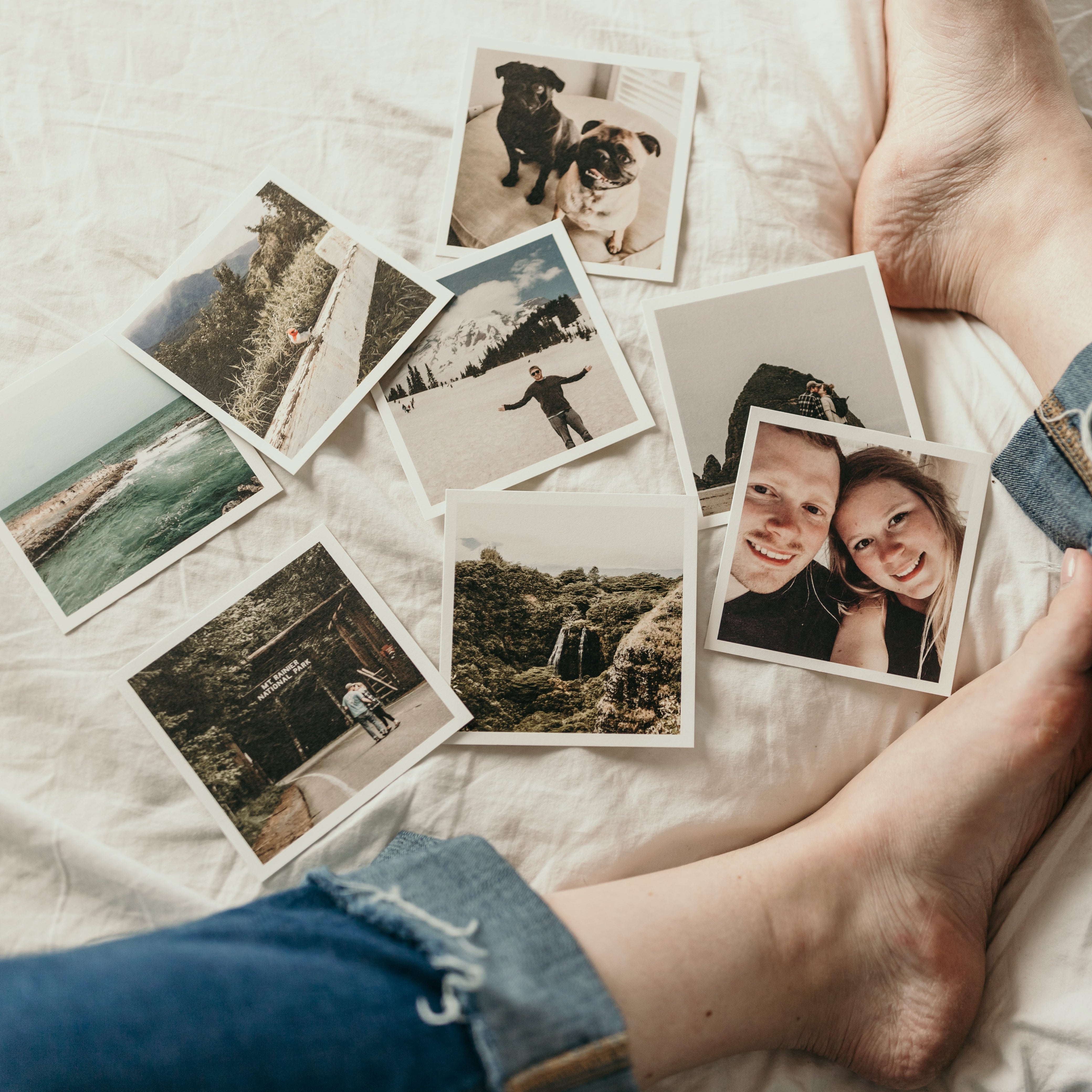 Person Sitting with Old Photographs