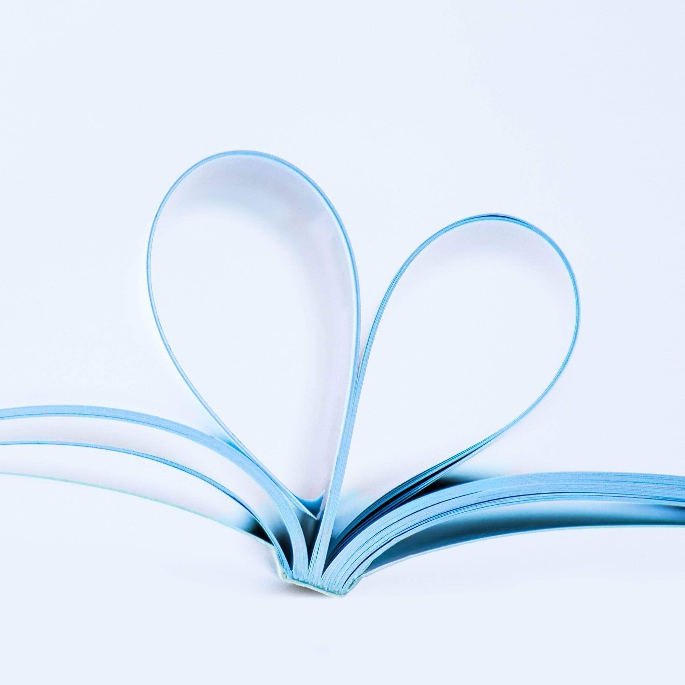 Magazine with pages folded into a heart