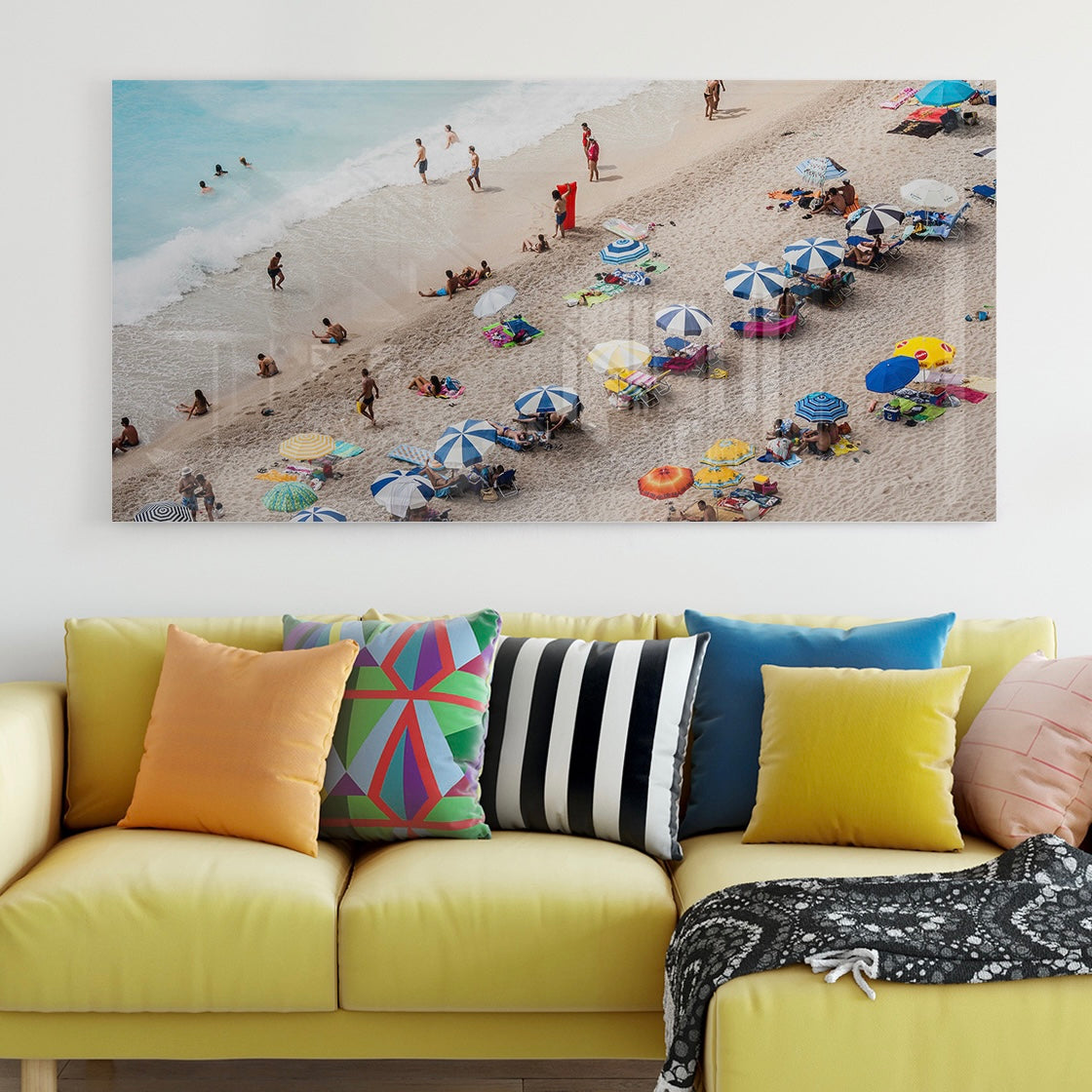 Large Acrylic Photo Print of Beach Scene Displayed Above a Couch